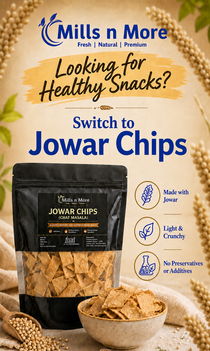A promotional product image for Mills n More Jowar Chips. A black stand-up pouch of Jowar Chips is shown on a rustic beige background with decorative jowar seeds, a small bowl of chips, and text highlighting benefits like 'Made with Jowar', 'Light & Crunchy', and 'No Preservatives or Additives'.