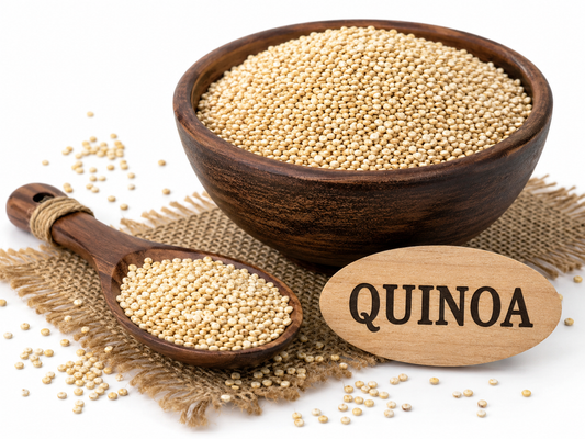 Quinoa millets in wooden bowl with quinoa millets in spoon, shown as fibre-rich positive millet.