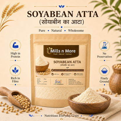 Mills n More Soyabean Atta pouch with soybeans and bowl of finely ground soybean flour.